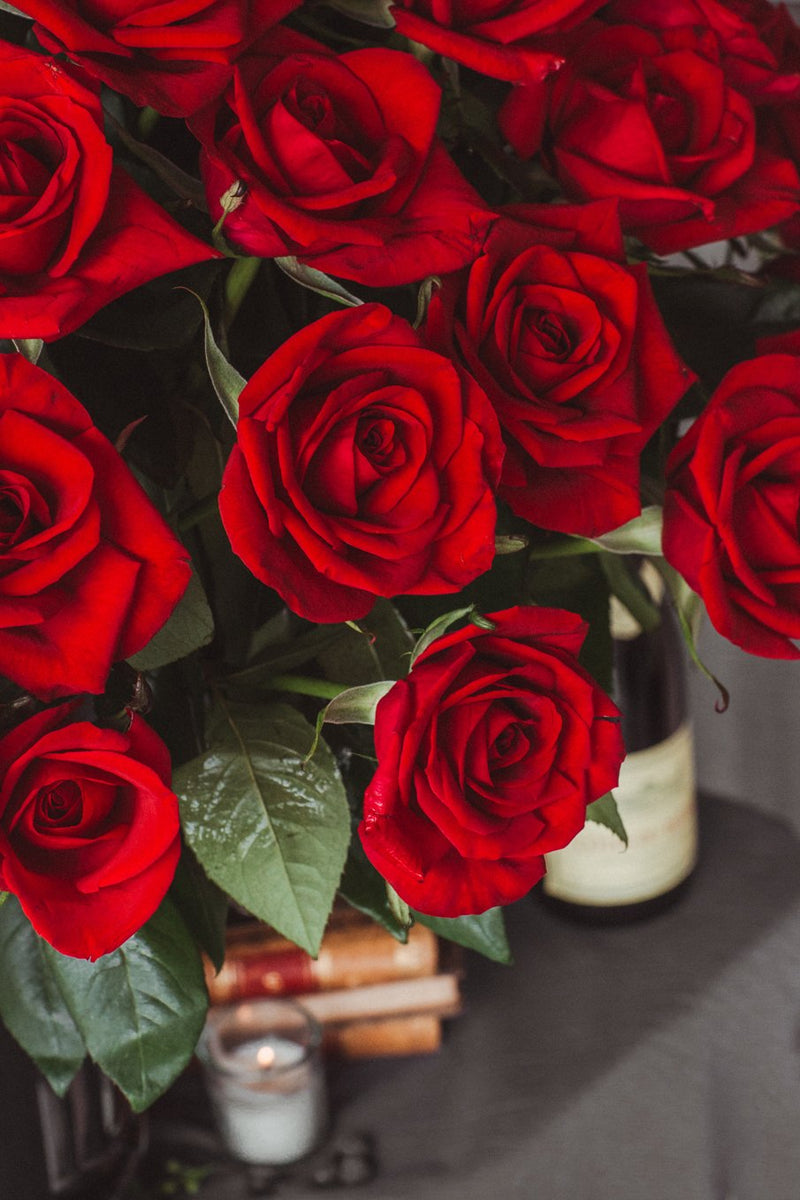 Constanza, 100 rosas rojas en arreglo floral